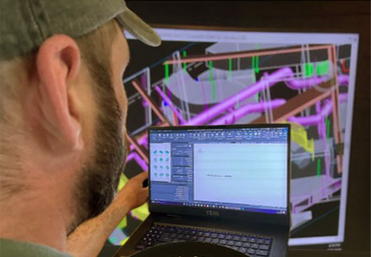 Larkin Hathaway team member reviewing specification in BIM software